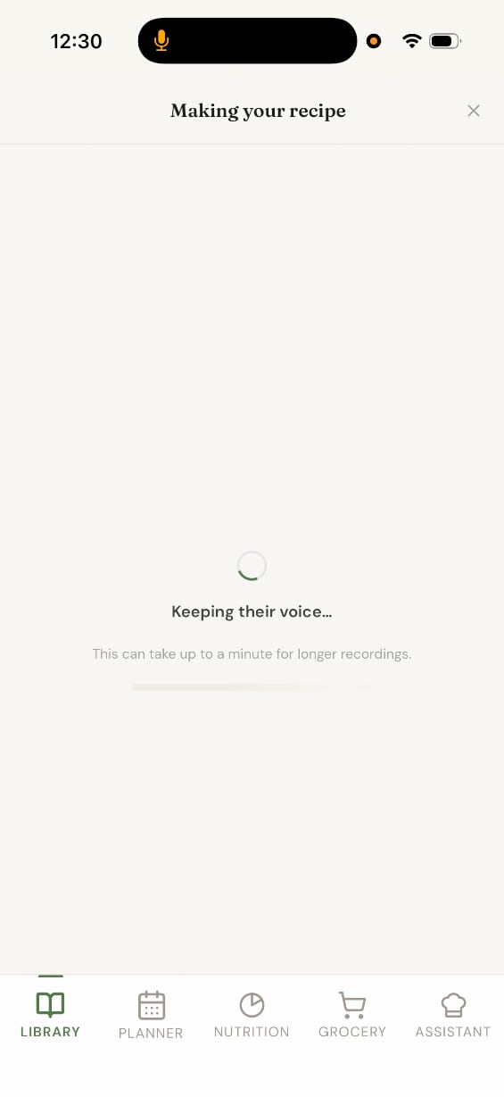 The processing screen in a quiet counter, reading Keeping their voice